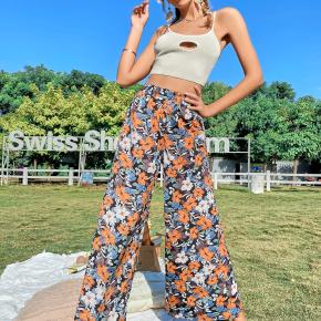 Customized Women's Summer Casual Comfortable Breathable Viscose Trousers Ladies Elegant All-Over Floral Printed Flared Pants